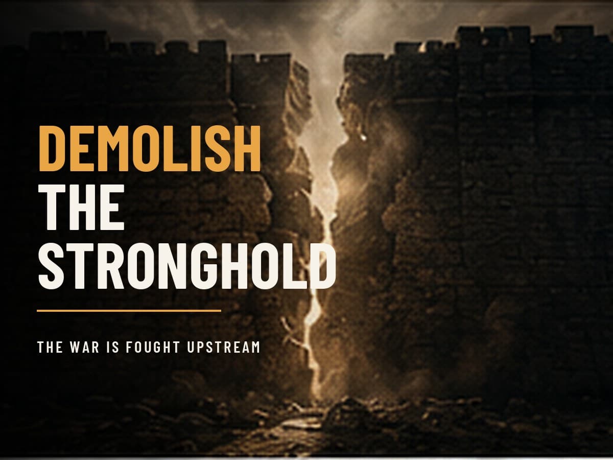 A massive dark fortress wall with a deep crack splitting through it and hard light breaking behind, in the dark cinematic style of the Take It by Force series, with the words "Demolish the Stronghold" set across the graphic.